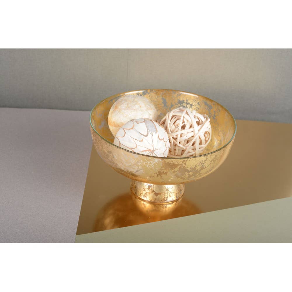 Coupe sur pied en verre doré