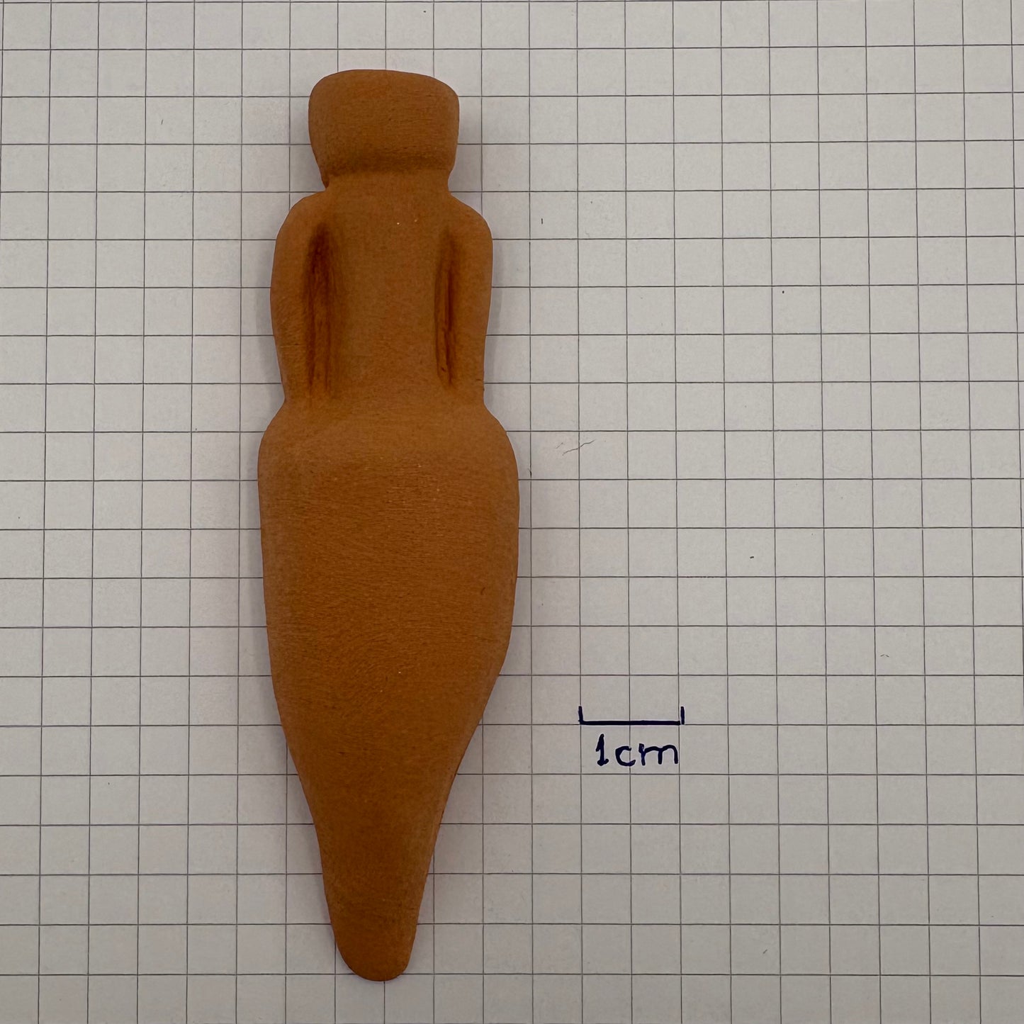 Petit aimant décoratif en céramique représentant une amphore à vin élancée de type Dressel 1B