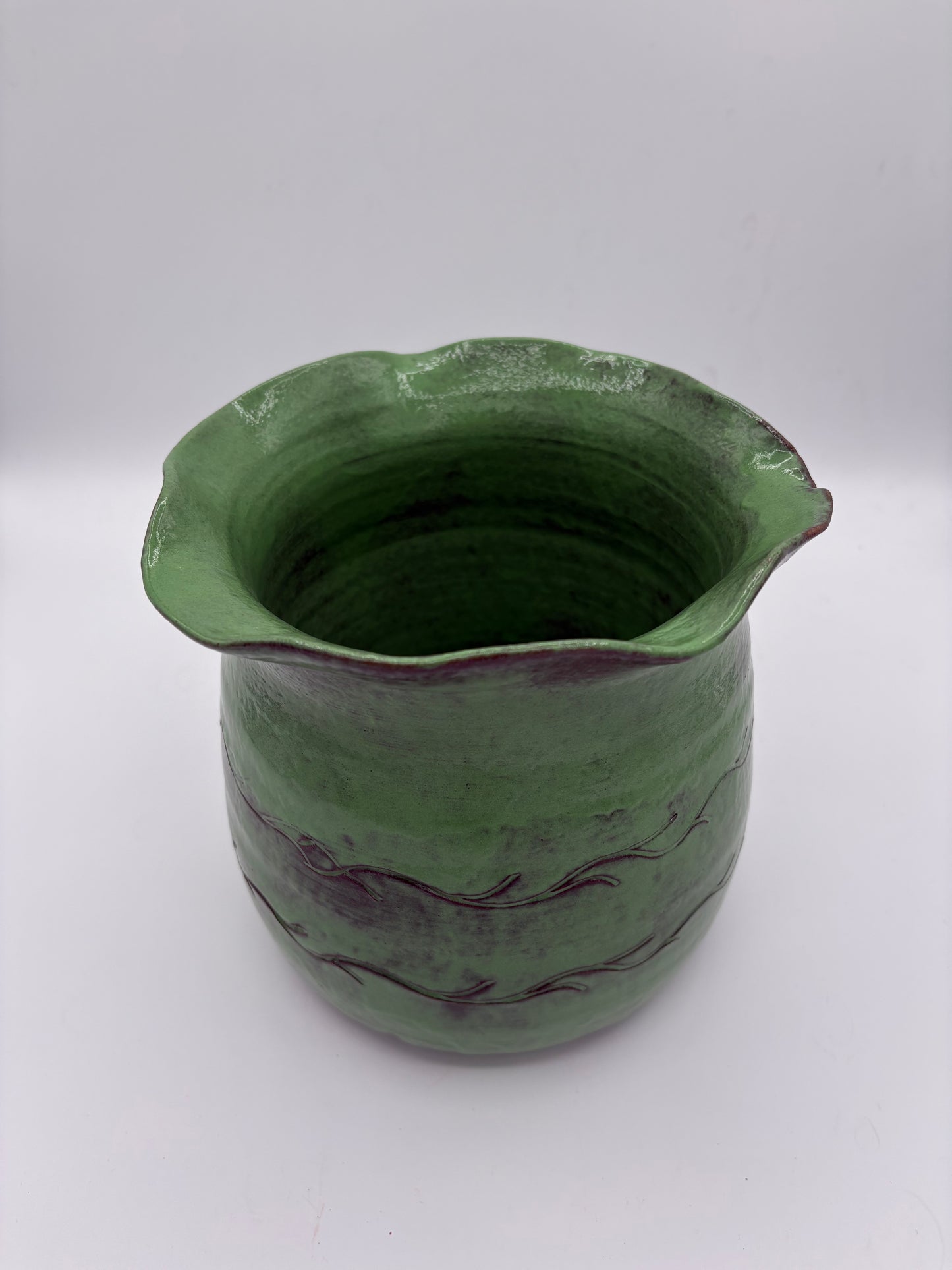 Pot vert aux lignes organiques