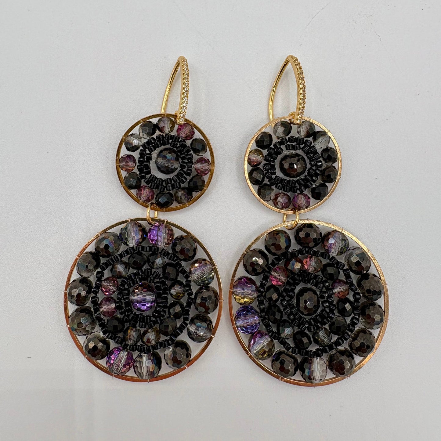 Boucle d'oreilles en tissage double noir violet